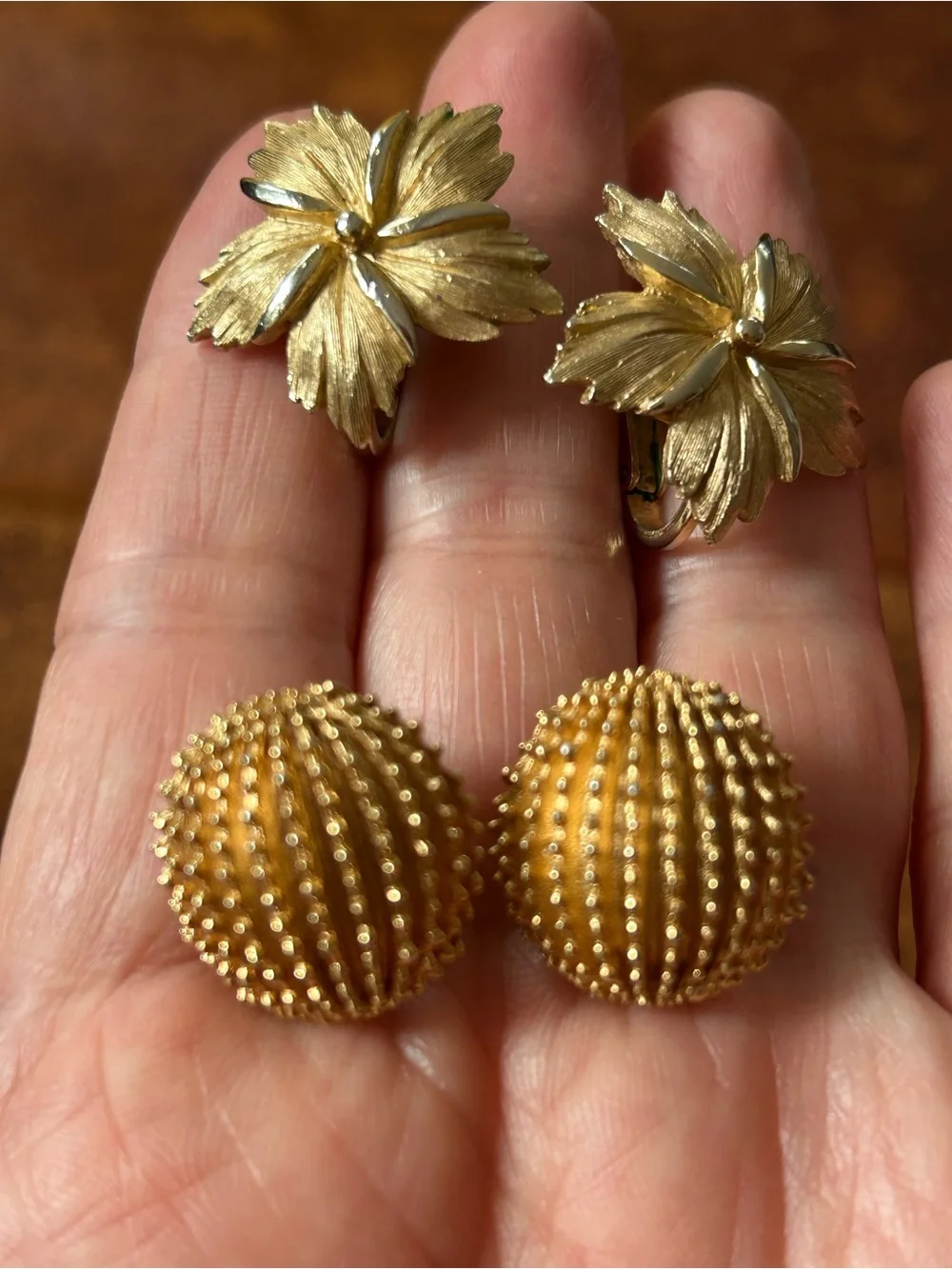 2 pairs of #CrownTrifari Clip-on Earrings. Gold-Tone Ribbed Domes and Florals.